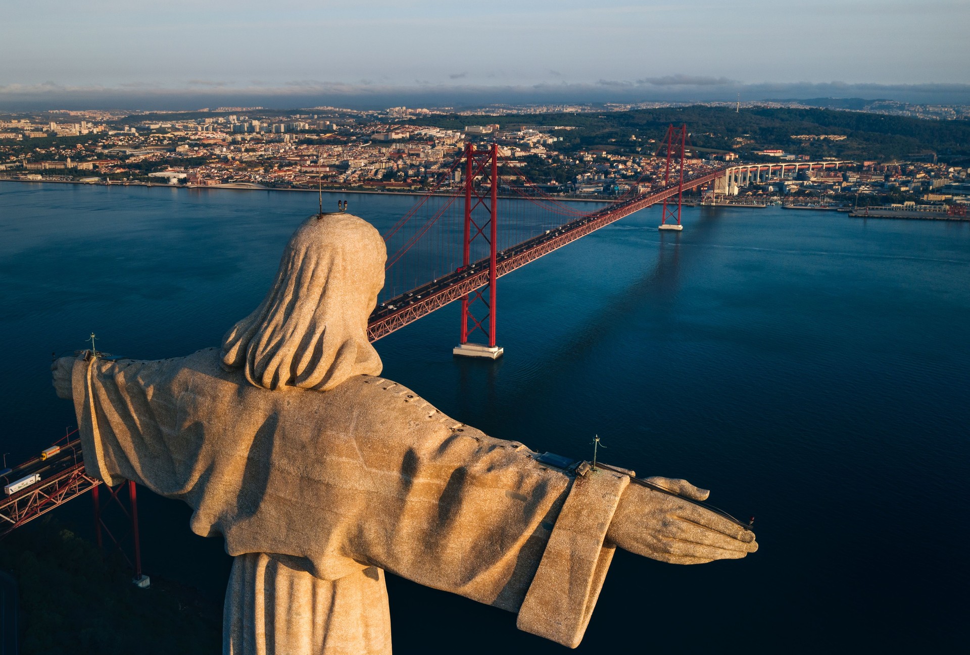 Aerial view of Sanctuary of Christ the King, Santuario de Cristo Rei. Drone photo at sunrise. Sightseeing in Portugal, Lisbon